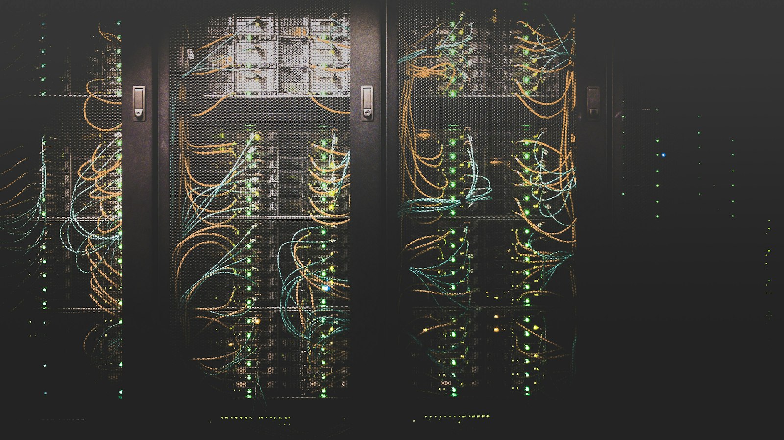 Server racks full of network cables